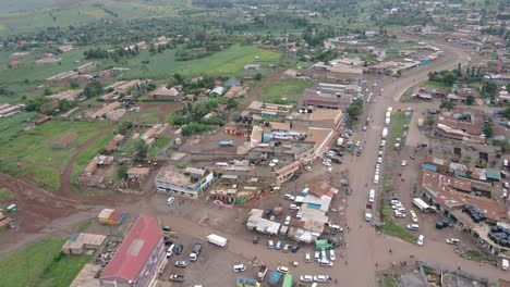 Rural-Houses-And-Dirt-Road-In-African-Village-In-Loitokitok,-Kenya---Aerial-Drone-Shot