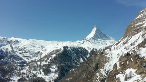 aerial dolly of a distant mount matterhorn