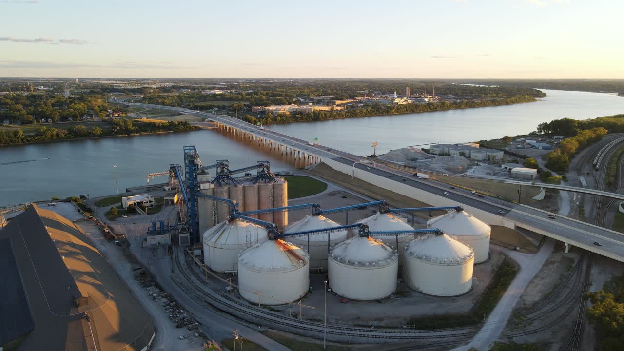 Grain silos near Maumee river, aerial drone view