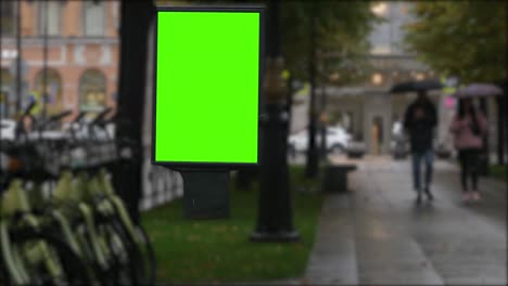 billboard green screen on a city street