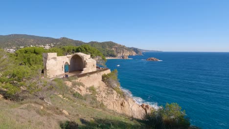 4K-video-of-Tossa-de-Mar-fishing-village-on-the-Costa-Brava-of-Gerona-near-Barcelona-Spain-European-medieval-tourism-turquoise-blue-water-beach