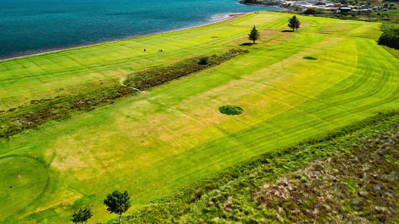 Aerial View of a Golf Course by the Sea