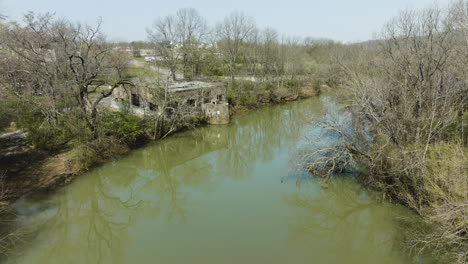 Establishing-shot-of-the-derelict-pump-station-at-West-Fork-White-River,-Arkansas