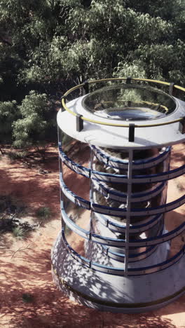 cylindrical structure in a desert forest landscape