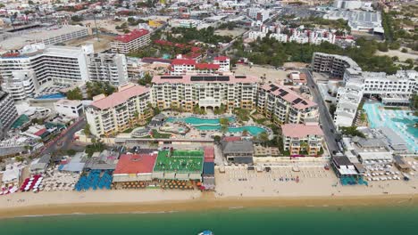 aerial: cabo san lucas beachfront hotels in mexico, baja california sur