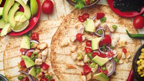 Freshly-made-healthy-corn-tortillas-with-grilled-chicken-fillet--big-avocado-slices