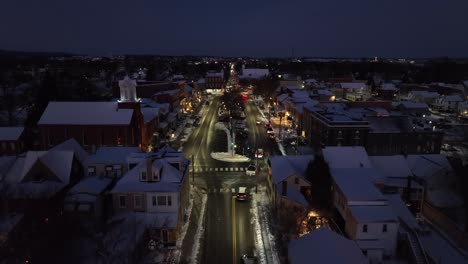 american town at dusk with snow