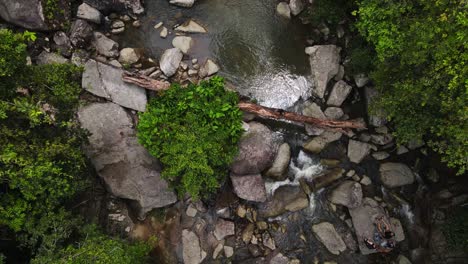 Drone-Aerial-Camera-Flying-Along-Evergreen-Thailand's-Mountain-Waterfall-and-Rainforest,-Koh-Phangan-Island,-Than-Sadet-Waterfall-Area