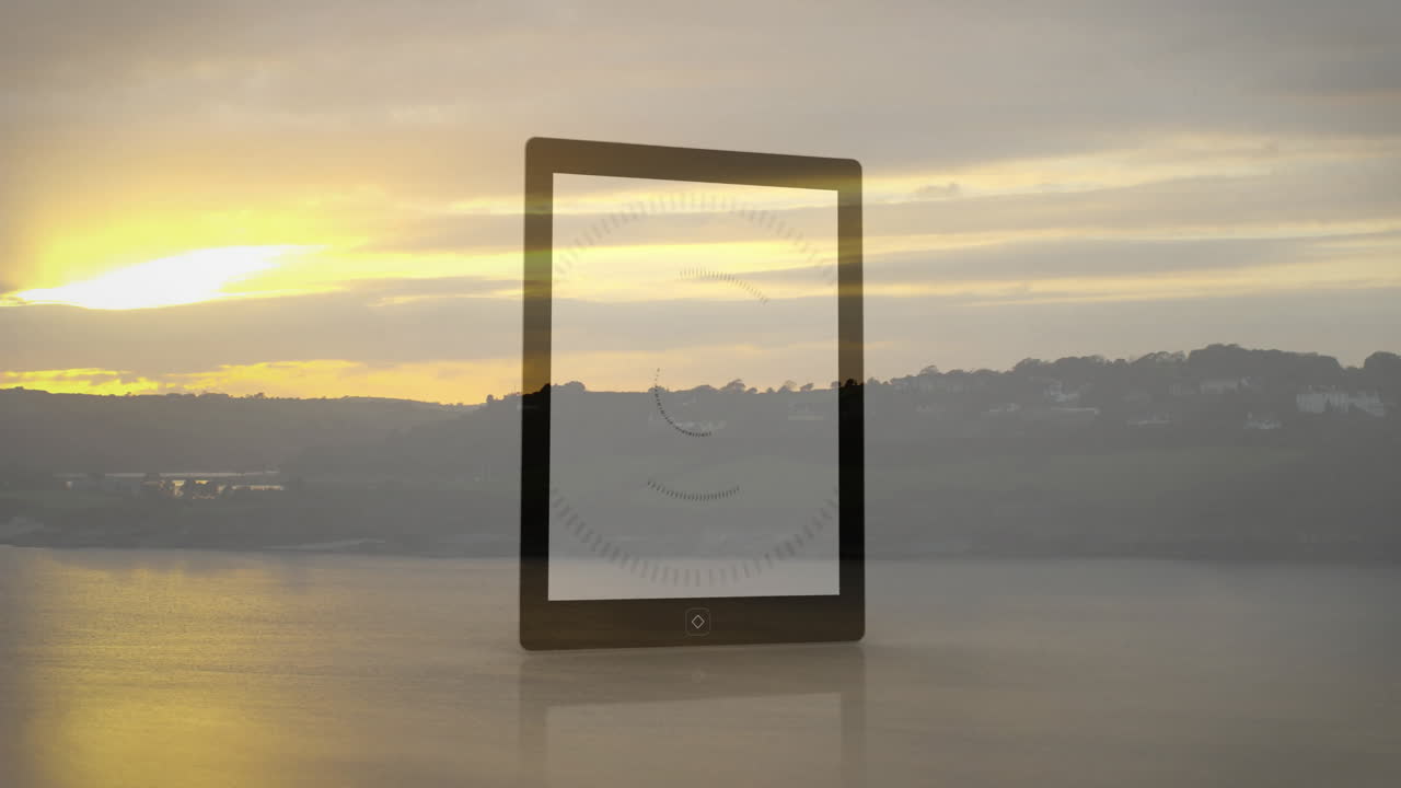 Digital interface animation over serene sunset landscape with calm water