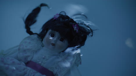 submerged porcelain doll