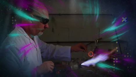 Animation-of-light-trails-and-dots-over-caucasian-male-scientist-working-in-lab