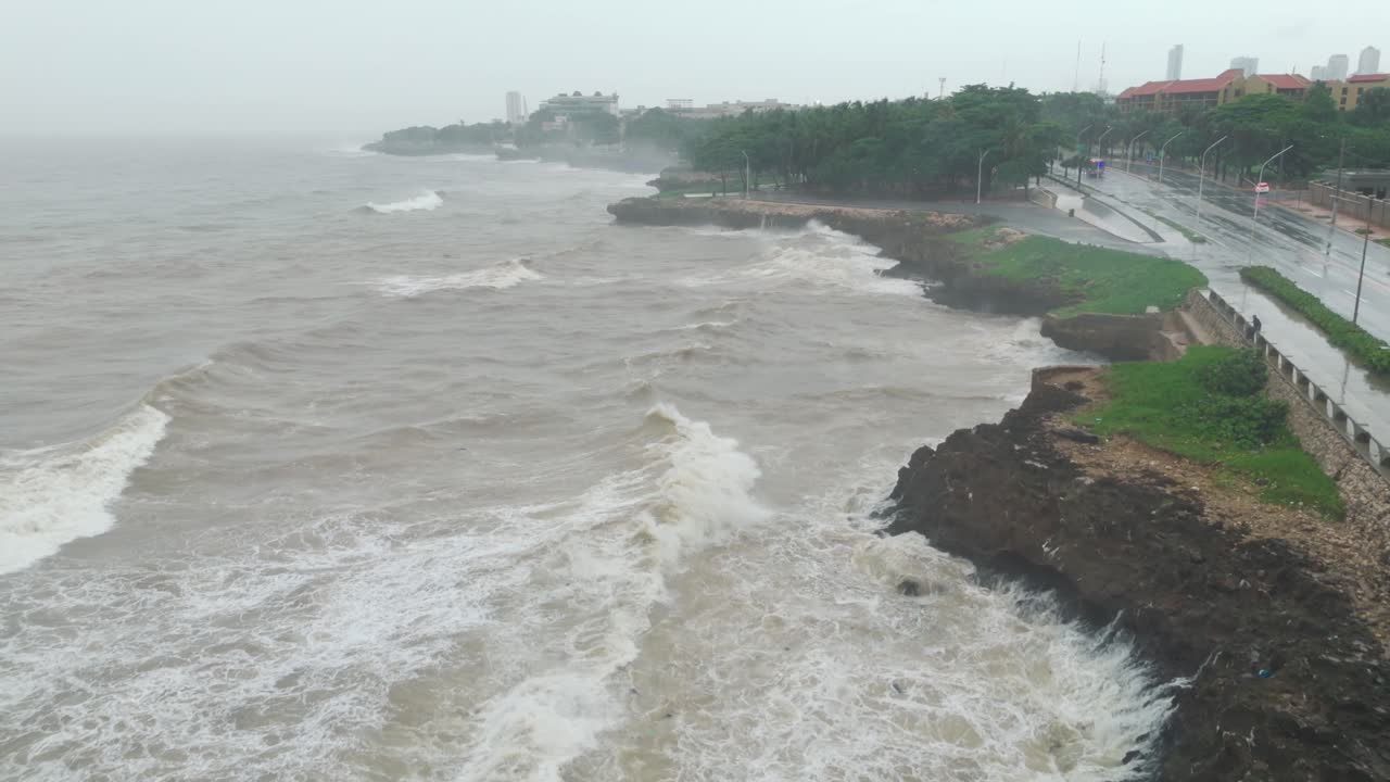 Stormy sea during Tropical Storm Melissa, Santo Domingo. Aerial forward