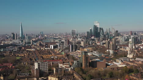 establishing aerial view of tower bridge, shard, london skyline, london, united kingdom