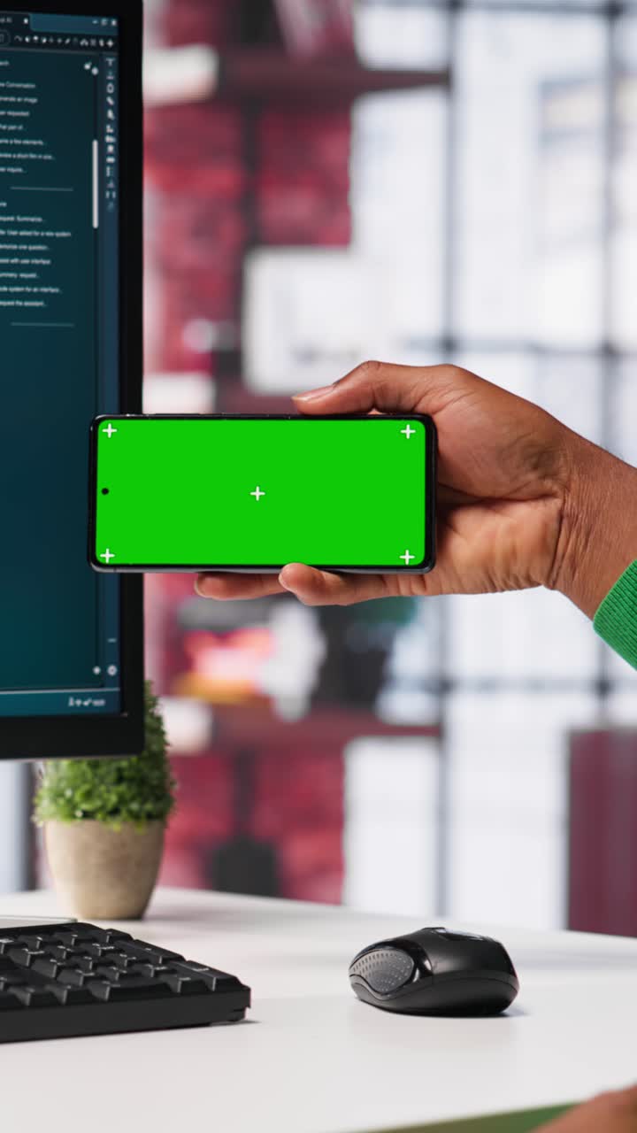 Vertical Video Man using AI chatbot to generate real time responses next to mockup display