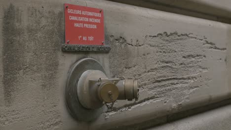 Closeup-Of-High-Pressure-Automatic-Fire-Hydrant-Sprinklers-On-Concrete