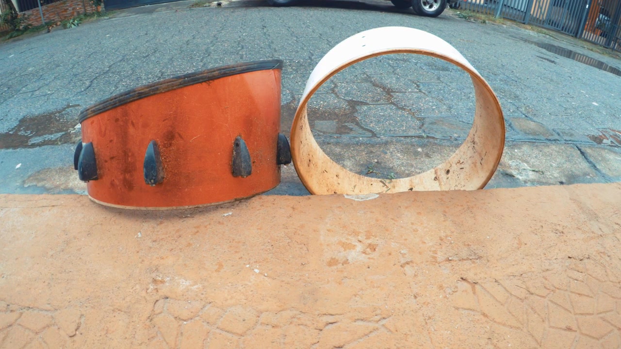 Old Drums Thrown Out on Curb