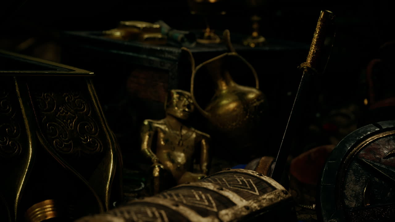 어 ⁇  속에서 보석과 금 동전을