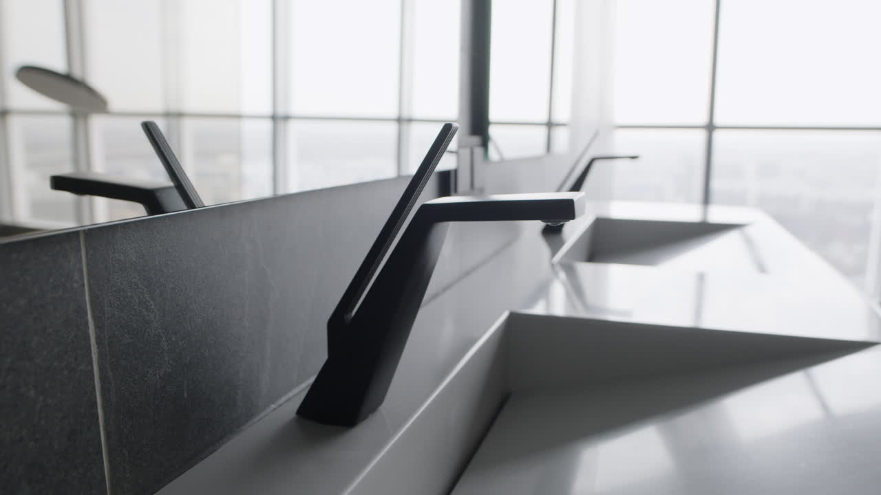 Modern Bathroom Sink with Black Faucet