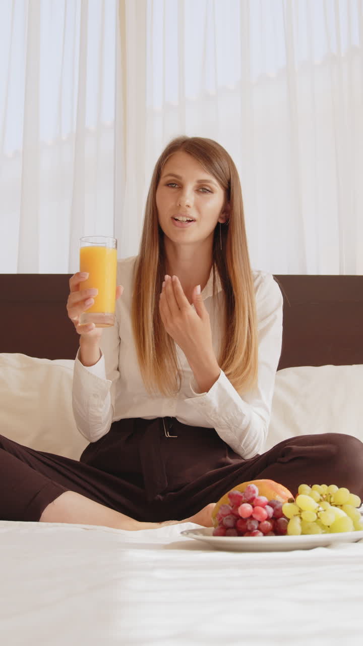 Woman with juice and fruit