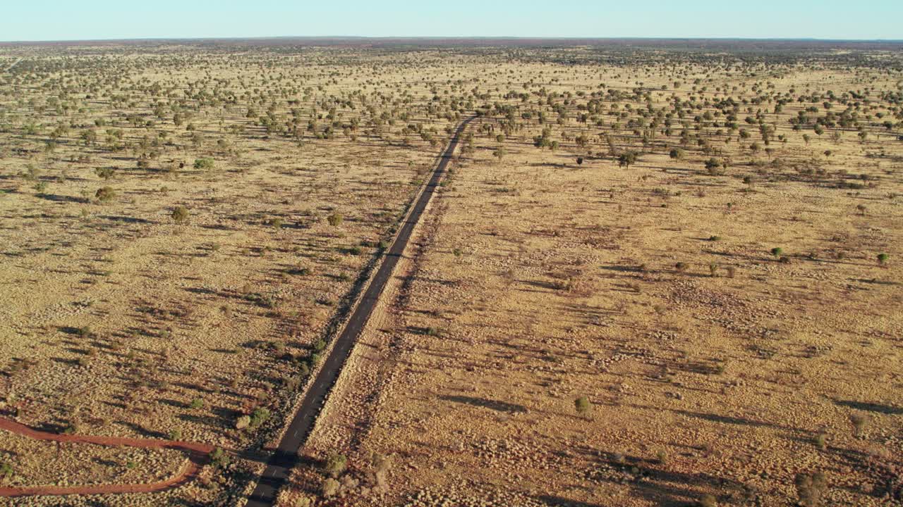 Aerial view along a road near Kings Canyon, Watarrka. Northern Territory, Australia. August 2022.