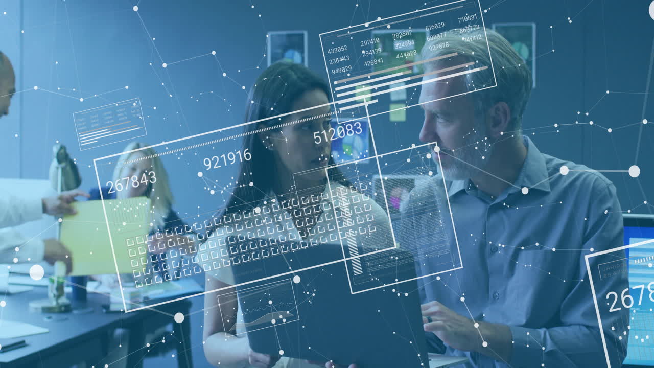 Collaborating in office, people with digital data and network connections overlaying them