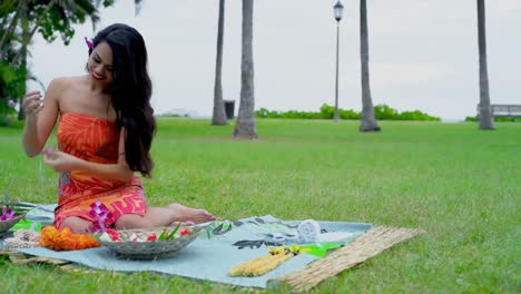 young woman preparing garland in the garden 4k