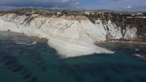 pull away aerial of white cliffs and the turkish steps in agrigento sicily