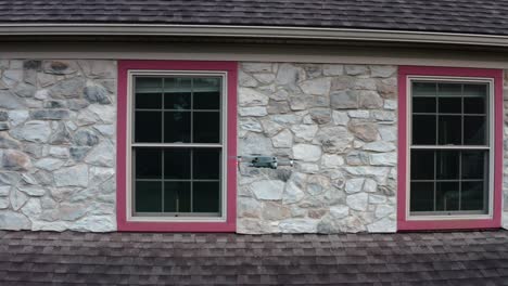 drone camera looks inside home windows