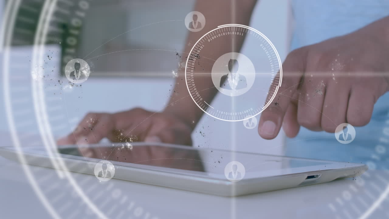 animación de la red con iconos sobre empresario afroamericano usando tableta digital en la oficina
