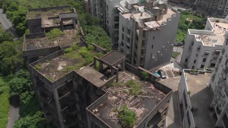 downwards drone tilt shot revealing macau city backdrop