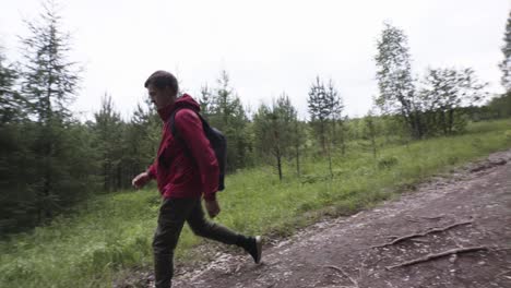 man hiking in forest