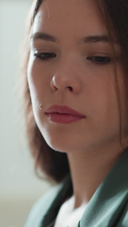 young woman feels stress at home closeup. upset lady with loose brown hair has obsessive thoughts at work. office worker with burnout of overloads