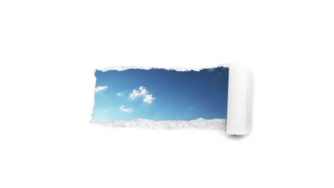 creative 4k time laps video of fast moving clouds in the blue sky that are visible through a hole with torn edges in white paper. the concept of opportunities, a happy future.