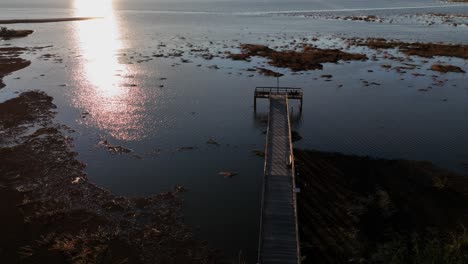 aerial view of dock on mobile bak at sunset in alabama