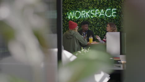 multi-ethnic-business-people-brainstorming-working-together-creative-marketing-team-sharing-ideas-discussing-strategy-enjoying-teamwork-in-trendy-startup-office-workspace