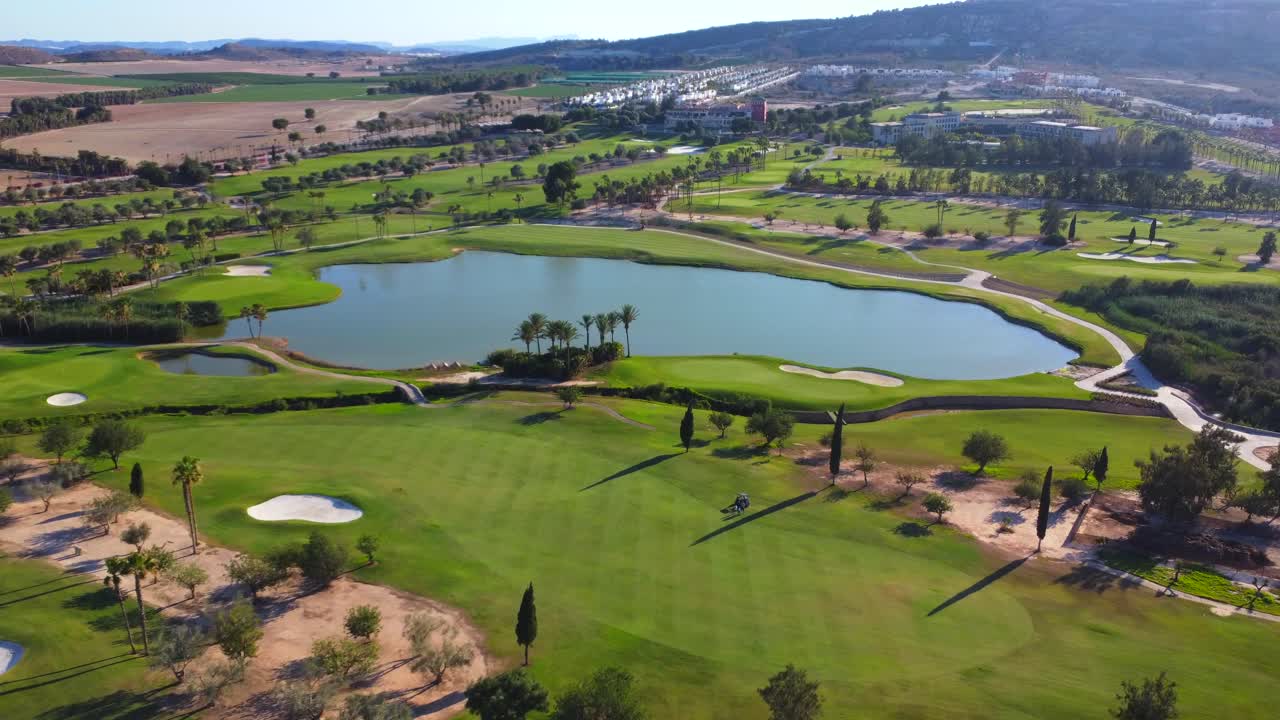 Scenic Golf Course with Lake and Green Landscape