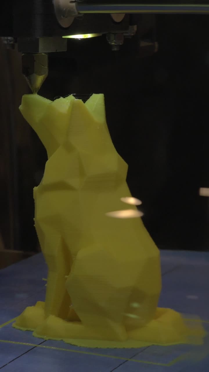 3D Printer Manufacturing a Yellow Geometric Dog Figure