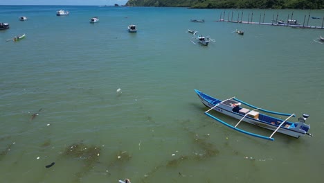 lots of boats along the coastline of south lombok in indonesia