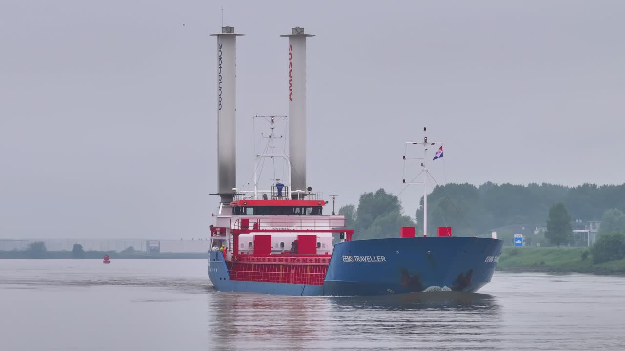 EEMS TRAVELLER Cargo Ship Equipped with Rotor Sails on a River