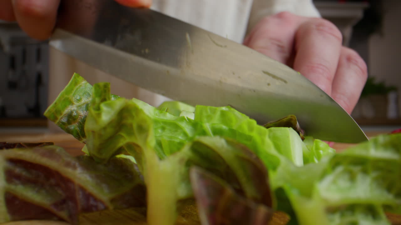 Person Chopping Lettuce