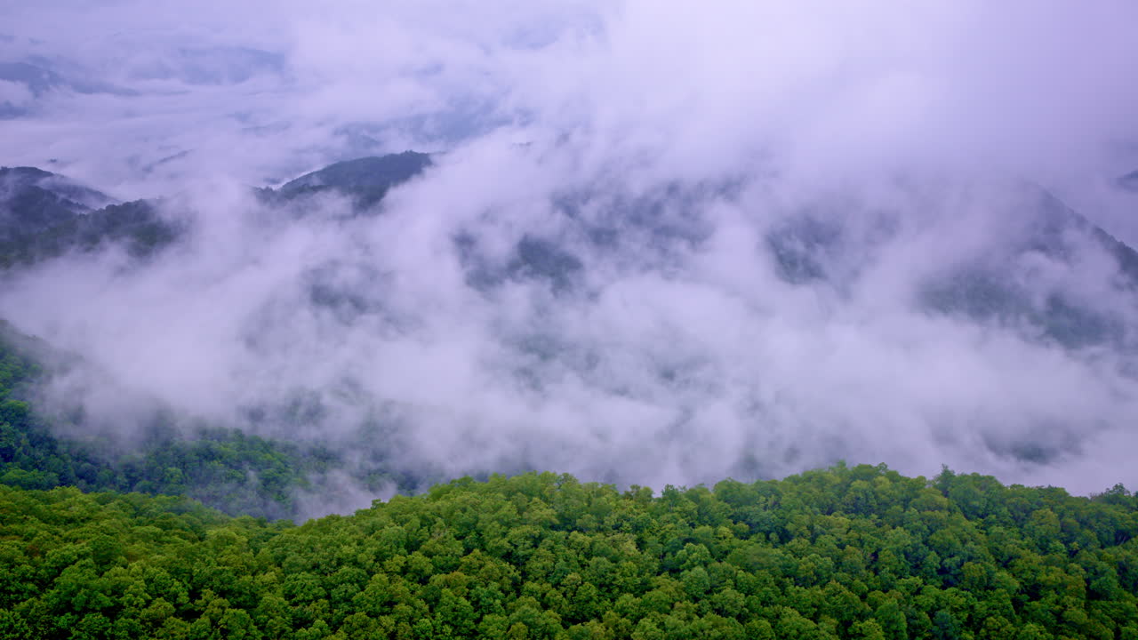 Layers of fog drift through the Smoky Mountains in this cinematic aerial