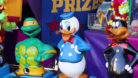 animated ducks in a carnival booth game sequence