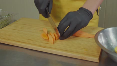 chef chopping carrots