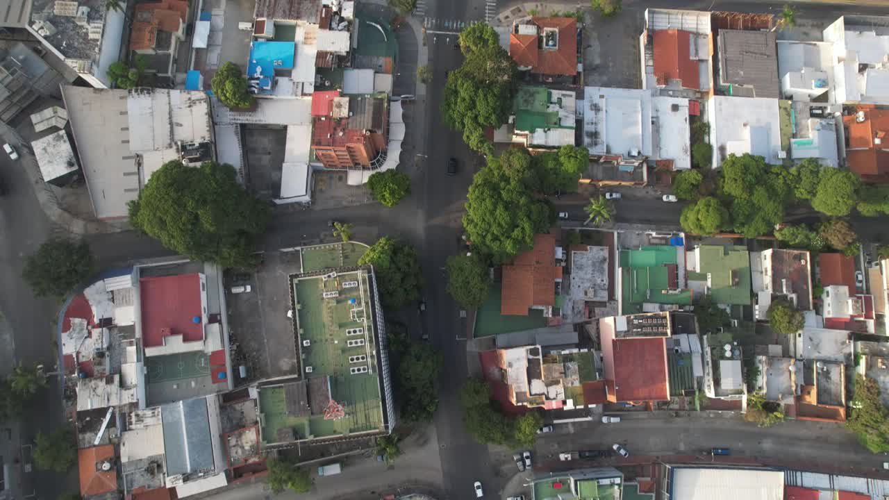 Los chaguaramos, urban streets, buildings, and main avenue in focus, aerial view