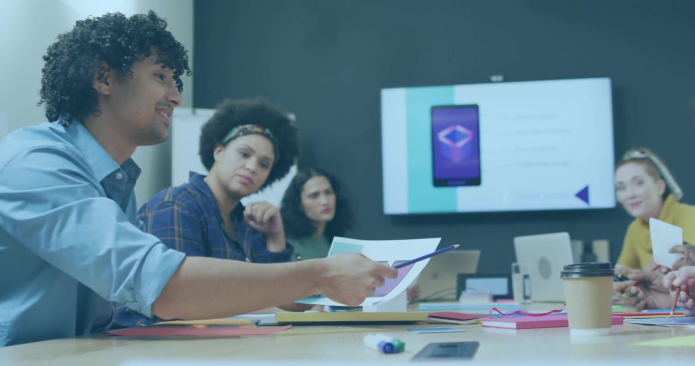 Animation of shapes over diverse business people in office