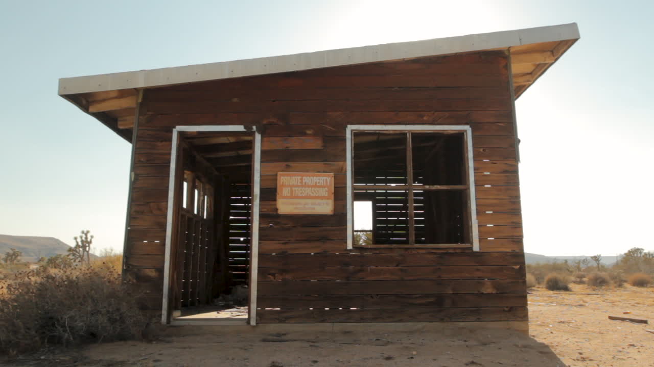 small shack-structure in the desert