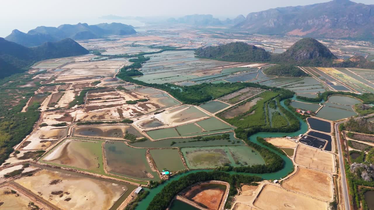 Thailand aerial view of Khao Sam Roi Yot National Park, known for its dramatic mountain peaks, lush wetlands, and peaceful water near Hua Hin beach
