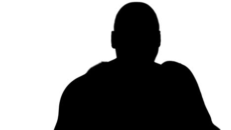 muscular silhouette of man boxing