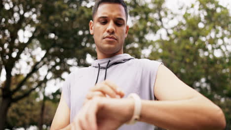 fitness, smart watch and pulse check of a man