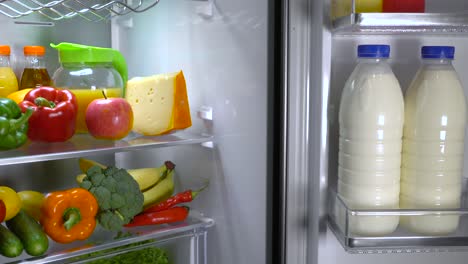 open refrigerator filled with food